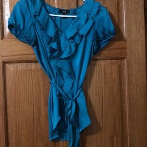 Turquoise blouse with ruffled front